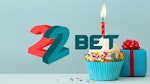 22bet logo med bursdagskake og presang i bakgrunn